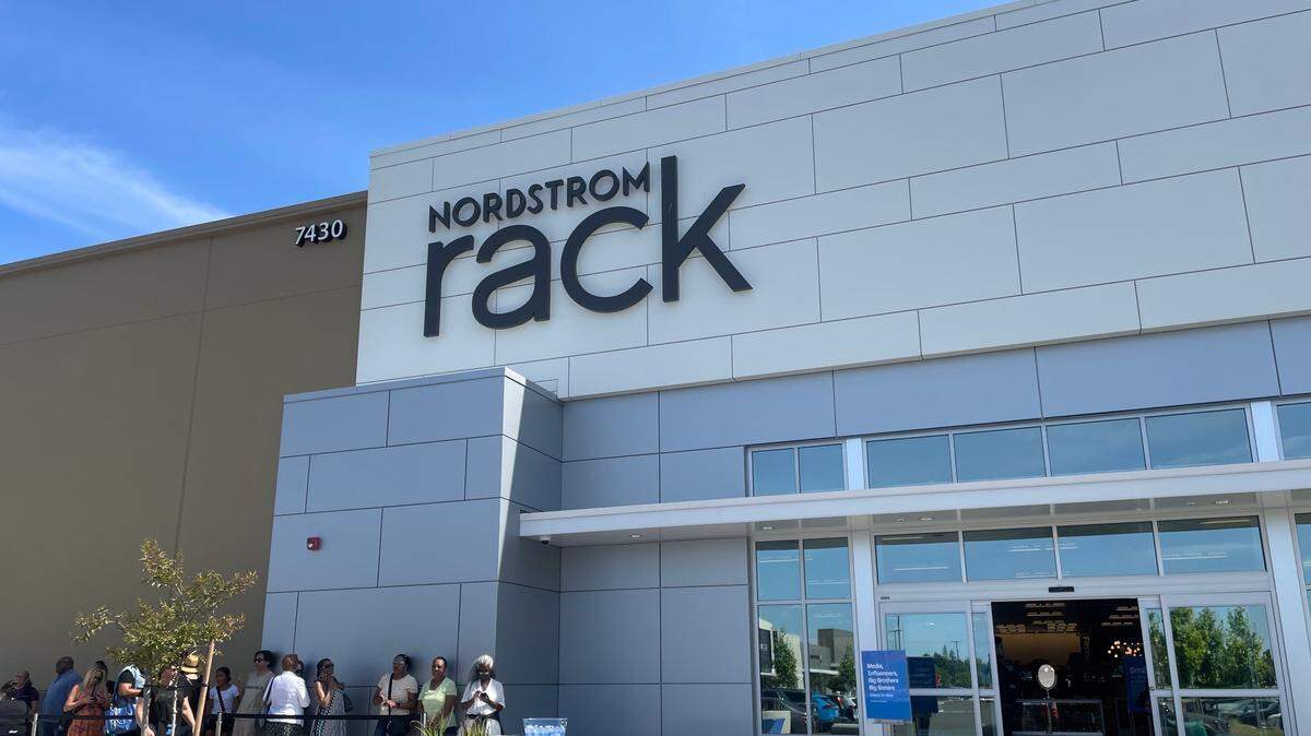 Shoppers line up Tuesday, May 28, 2024, for a VIP shopper sneak peek of the new Nordstrom Rack department store location at Elk Grove’s The Ridge shopping center.