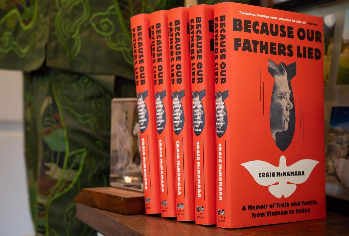 Copies of Craig McNamara’s “Because Our Fathers Lied: A Memoir of Truth and Family, from Vietnam to Today,” sit on a shelf at his farm on Aug. 18. He said his father, former Vietnam War-era Defense Secretary Robert McNamara, did not anticipate the negative response to his own memoir released in 1996, “In Retrospect: The Tragedy and Lessons of Vietnam.”