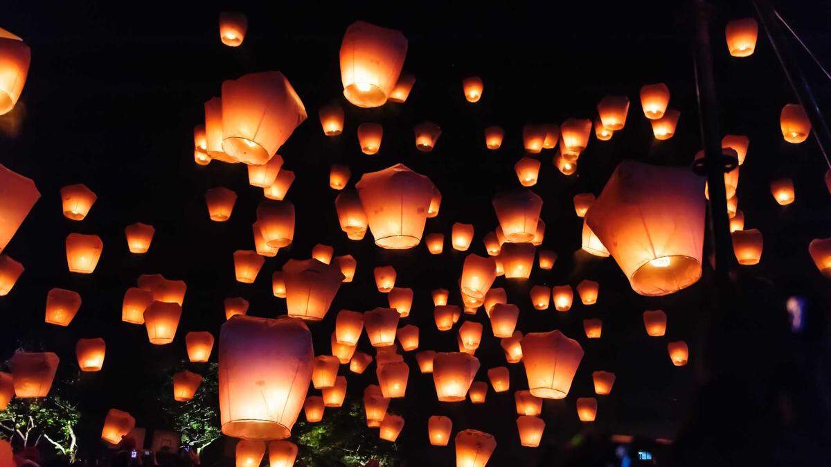 Sky lanterns are photographed during a festival in Taiwan in 2014. A lantern festival planned for an open field south of Mather Airport has been canceled by county fire officials who say such events are illegal in California.