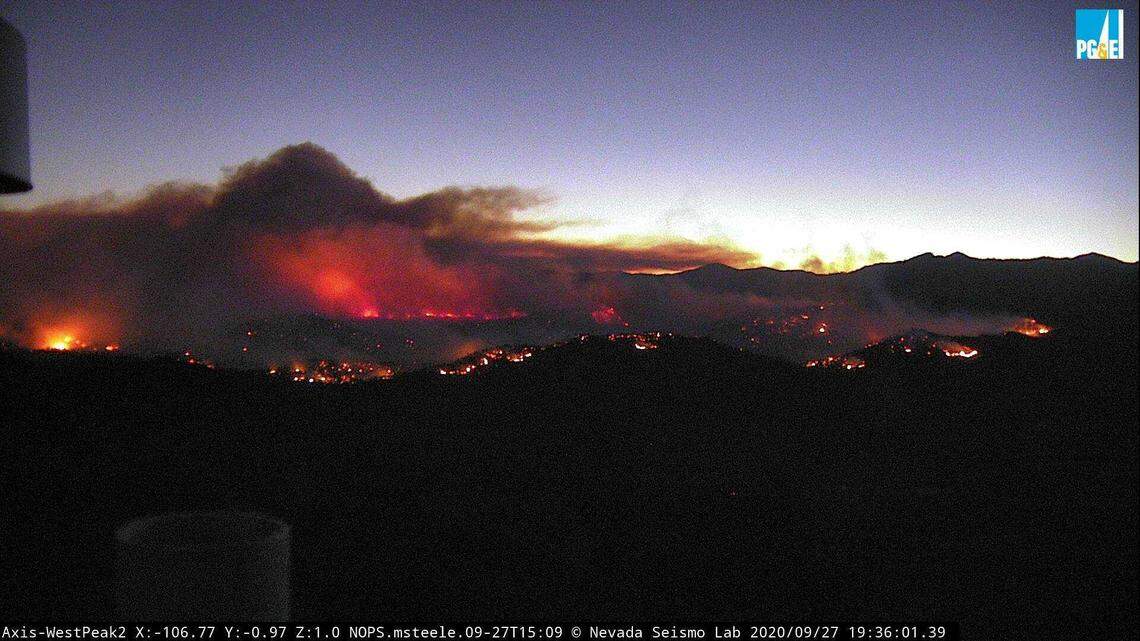 In an image take from a video camera operated by PG&E and distributed by the Alert Wildfire network, the Zogg Fire is seen burning in Shasta County near Igo, Calif., on Sept. 27, 2020. The fire, which started around 3:30 p.m. had burned 7,000 acres by 7:30 p.m., Cal Fire official said.