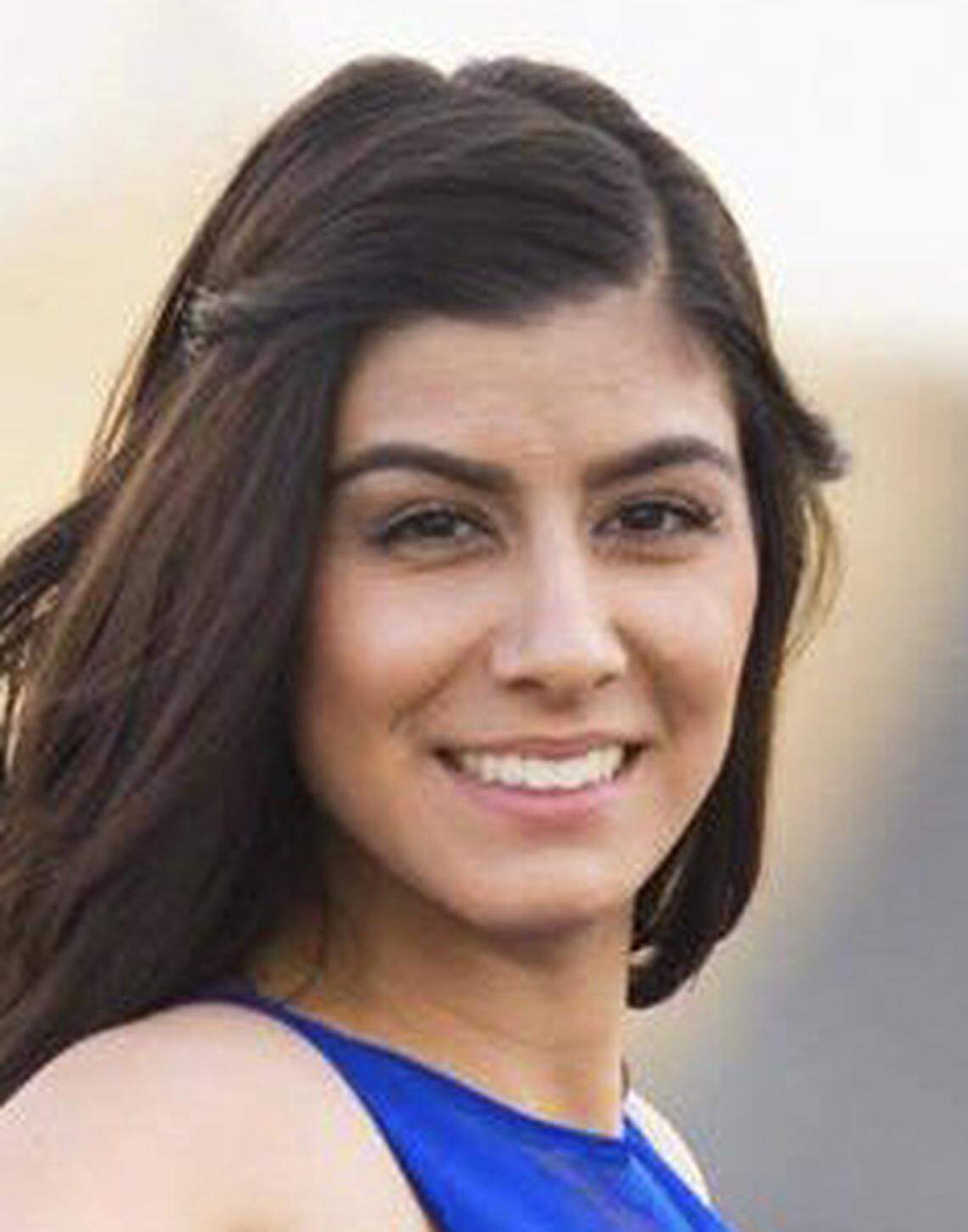 This portrait of Natalie Corona by Richard Laus shows the Davis Police officer who was killed in the line of duty on Thursday.