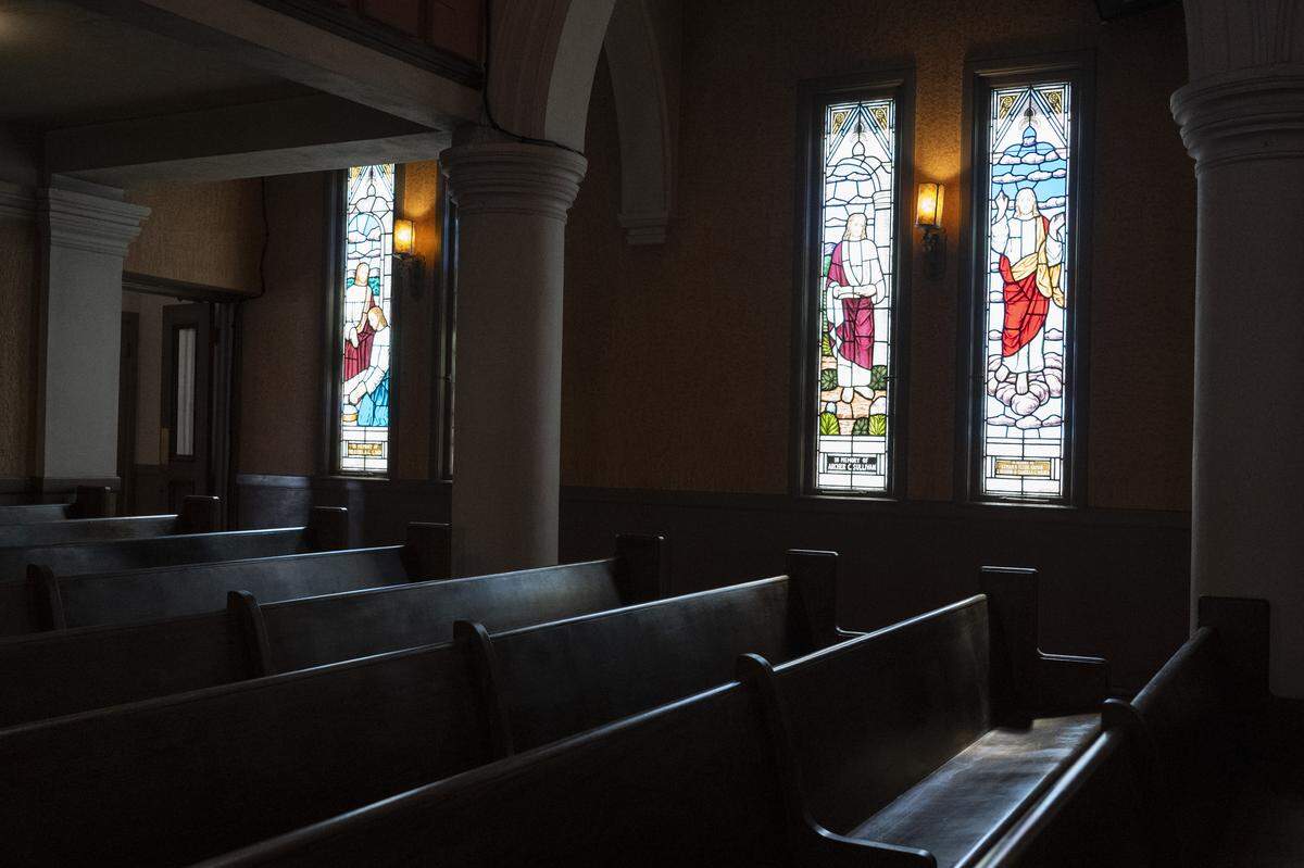 Empty pews before the final service of Pioneer Congregational United Church of Christ at their church on L Street in Sacramento on Sunday, May 31, 2026.