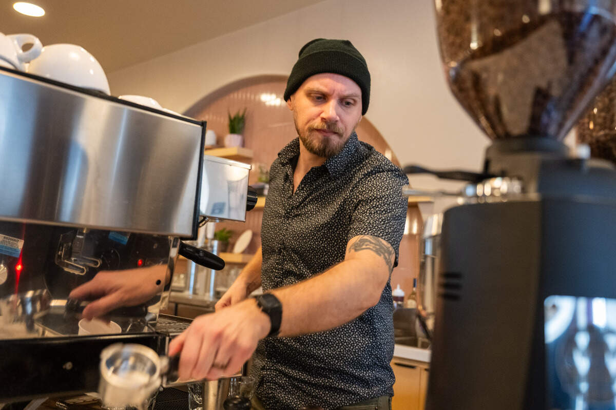 Bar manager Taylor Newbold makes espresso at Brew Bird Creative Cafe in Sacramento on its opening day in January. The CEO of the cafe plans to open a second location in Granite Bay.