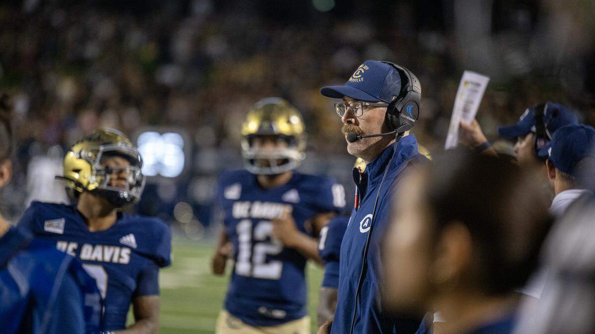 UC Davis Aggies football coach Tim Plough watches the action against Southern Utah Thunderbirds in September.