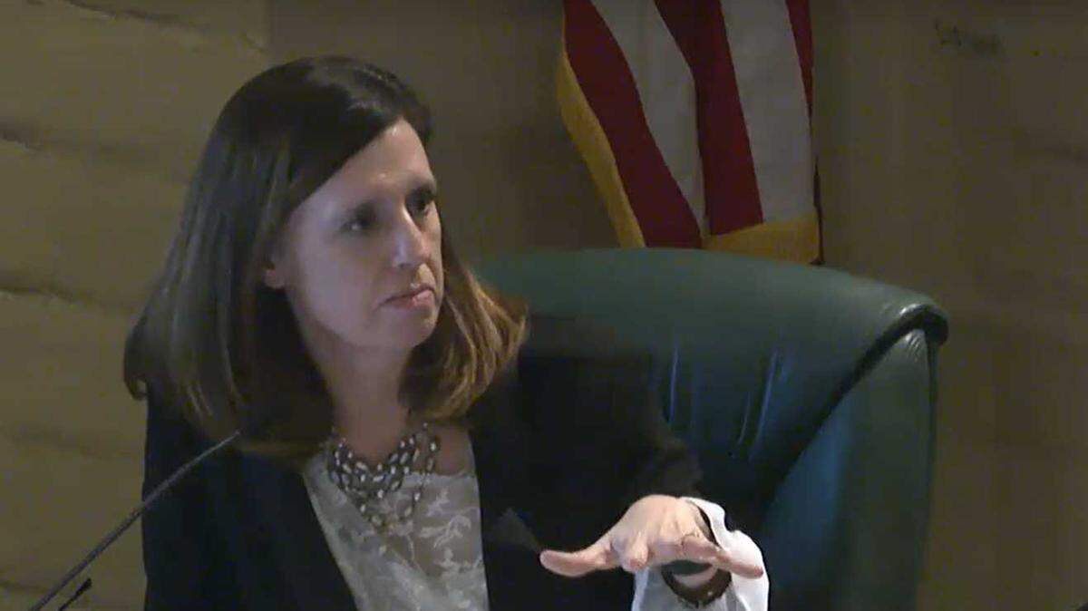 Folsom City Manager Elaine Andersen talks to Councilwoman Anna Rohrbough on the council’s dais about funding sources for items within a proposed five-year plan on March 28. The city adopted an economic and community plan that aims to complete certain projects by 2028.