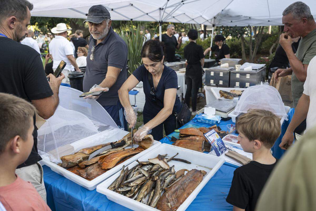 Different types of fish is served during a Ukrainian Independence Day celebration at the California Capitol in Sacramento on Sunday.