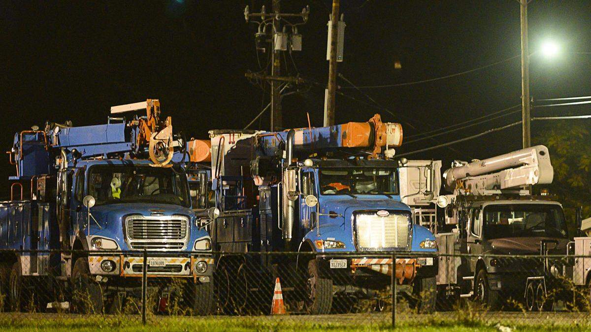 PG&E trucks are staged in Auburn after the company implemented a massive public safety power shutoff on Wednesday, Oct. 9, 2019.