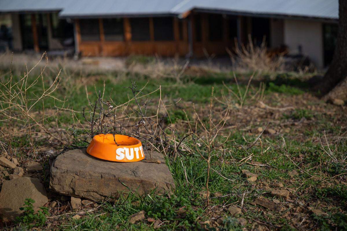 A dog bowl in tribute to Sutter, the Browns’ corgi who died in 2016 during Jerry’s last term as governor, marks his final resting place on the ranch.