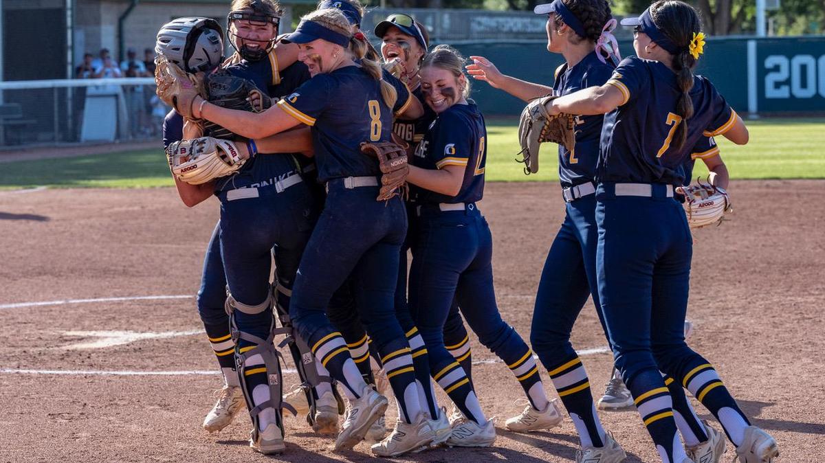 The Oak Ridge Trojans celebrate their 3-2 win in the CIF Sac-Joaquin Section Division I championship softball game Saturday against the Del Oro Eagles at Sacramento State.