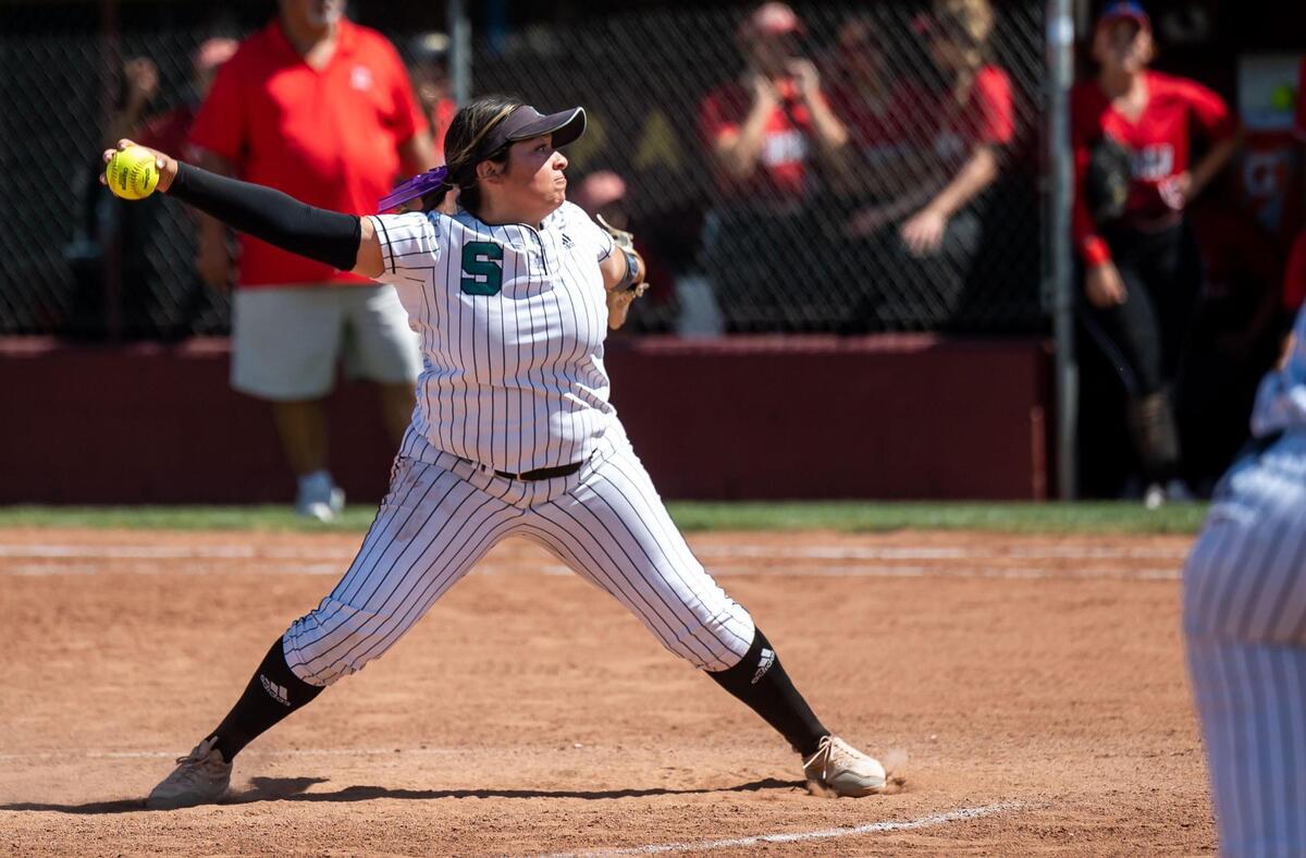 Sheldon pitcher Breanna Romero throws her last pitch of the game during the Huskies’ 7-1 win over Lincoln, of Stockton, for the Sac-Joaquin Section Division I high school softball title Saturday at Sacramento City College.