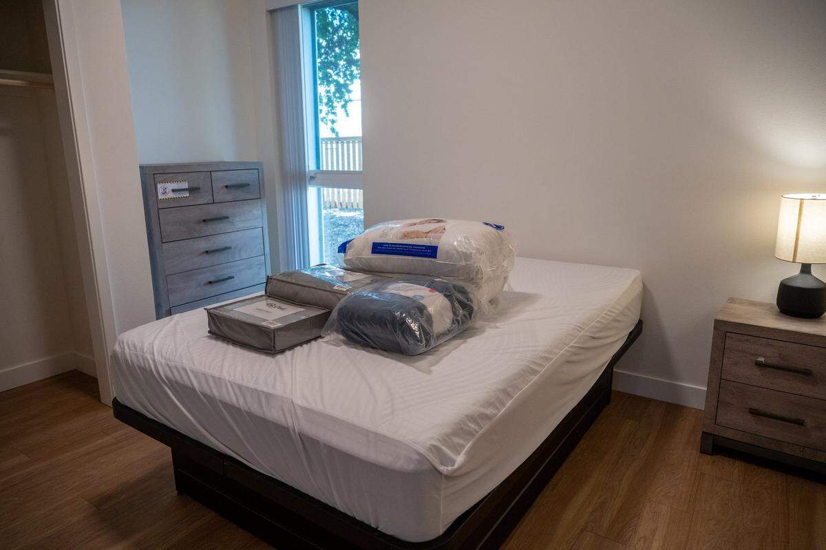 Supplies for new residents are stacked on a bed at the Northview Pointe apartments in North Sacramento on Wednesday.