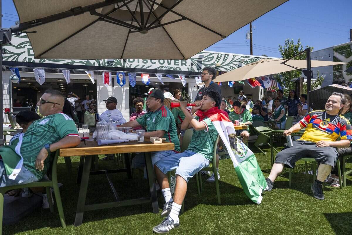 World Cup soccer fans react during a watch party at Garden at the Line in Sacramento on Thursday.