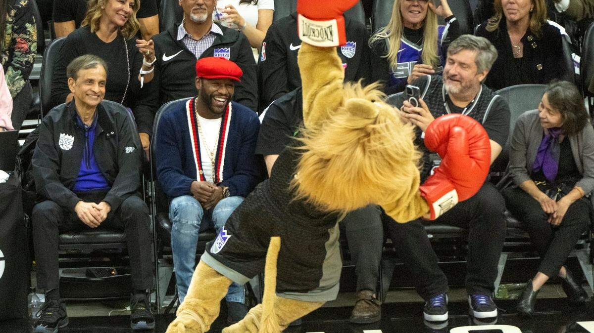 Sacramento Kings mascot Slamson reacts to a fake knock-out punch by Floyd Mayweather Jr. during Game 2 of the first-round NBA playoff series at Golden 1 Center on Monday, April 17, 2023.