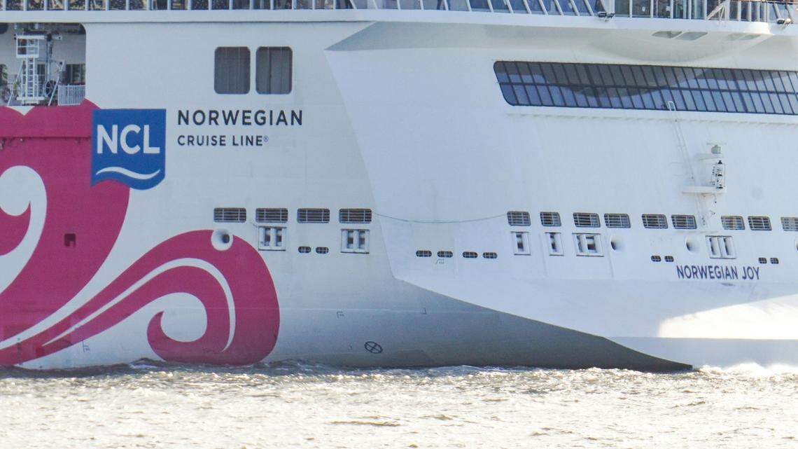 A Norwegian cruise ship employee is accused of stabbing a woman and two security guards, feds say. The Norwegian cruise ship pictured is not the vessel where the alleged attack occurred.