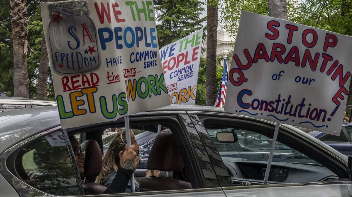 Demonstrators converged on the California Capitol in Sacramento on Monday, April 20, 2020, to protest the state’s stay-at-home orders to slow the spread of the coronavirus.