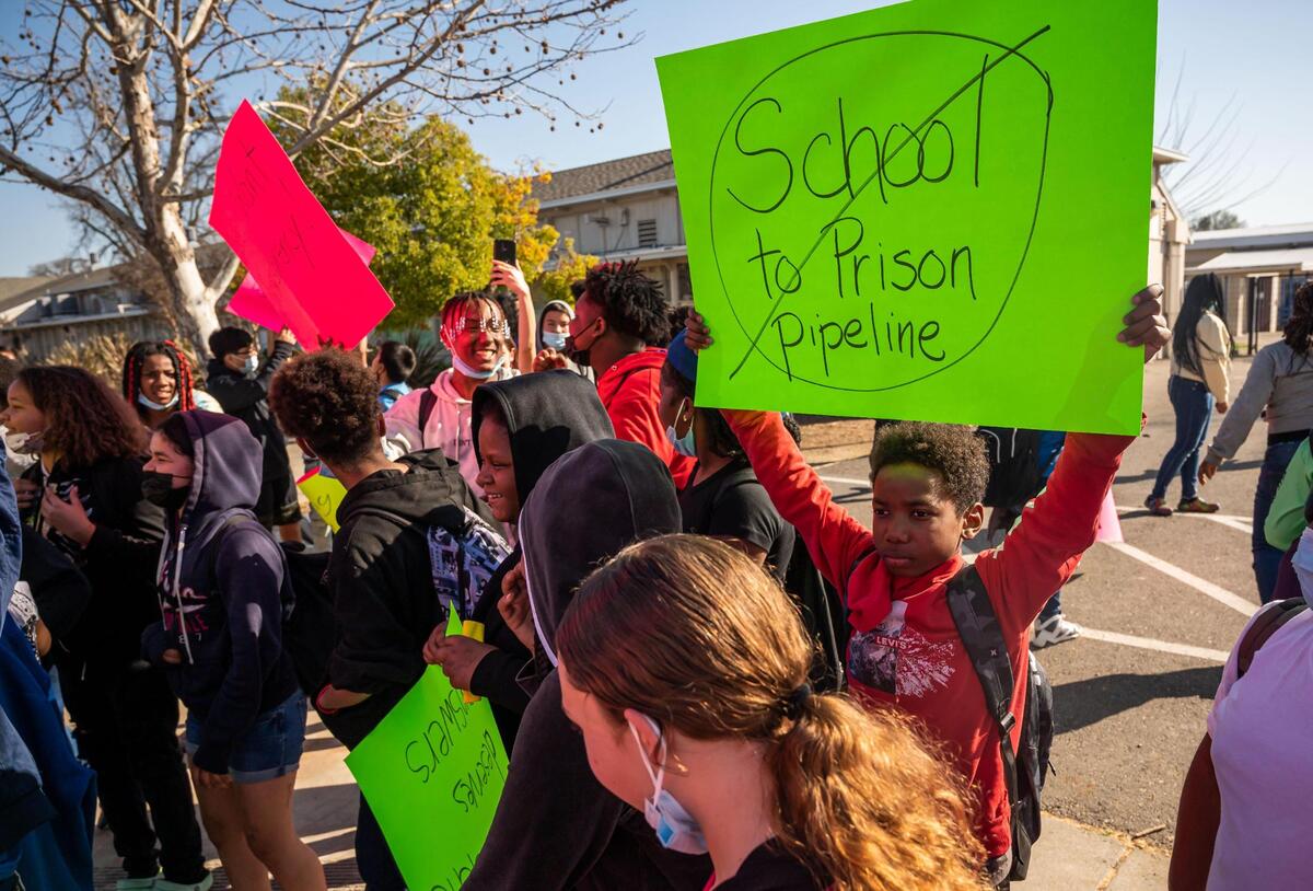 Oakdale School students demonstrate during a walkout Friday, Feb. 11, 2022, joined by some parents and community members outside the school in North Highlands. The protest was held to call for transparency and in support of former principal Kadhir Rajagopal, known as Dr. Raja, who was removed from the position by the Twin Rivers Unified School District.