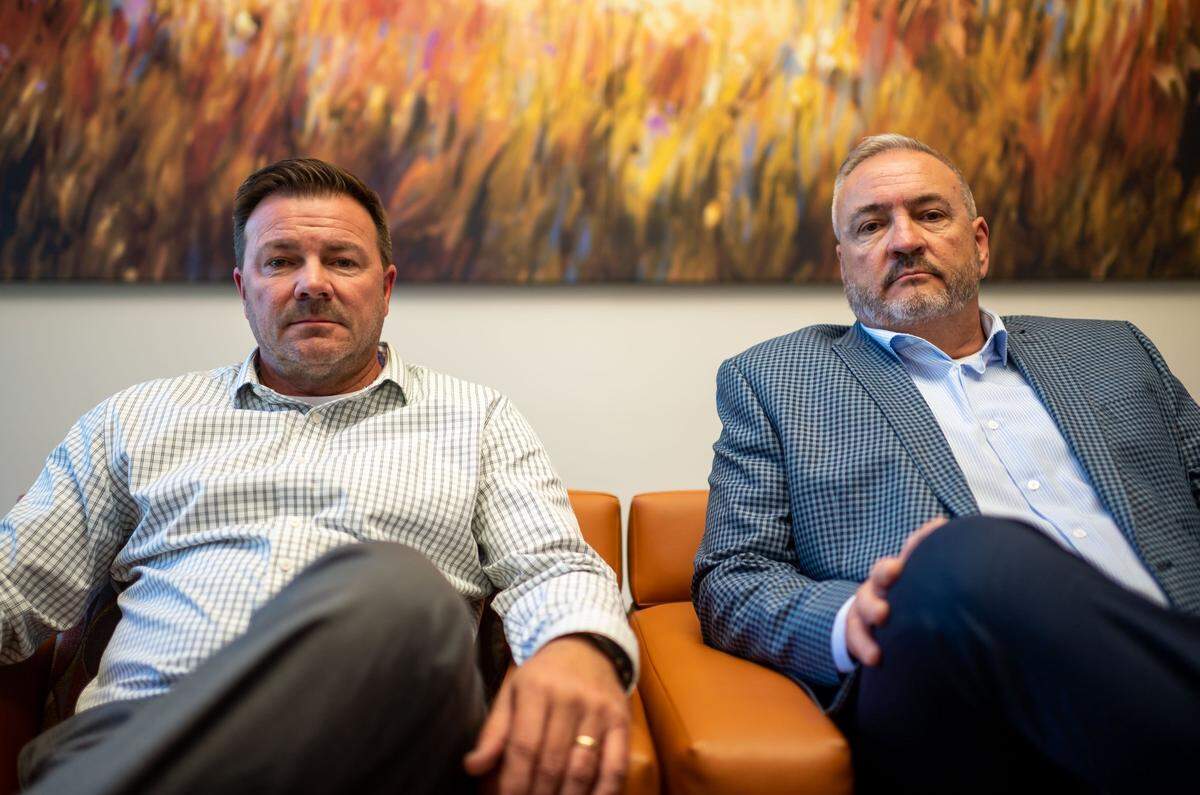 Scott Sorgea, right, and his younger brother, Darren Sorgea, sit together after an interview in March where they detailed the sexual abuse they say happened at the hands of their former Capital Christian School coach and teacher Dave Arnold, and later covered up by adults at the Sacramento private school. The two men, among a handful of former students taking legal action, spoke alongside their legal representation in Sacramento.