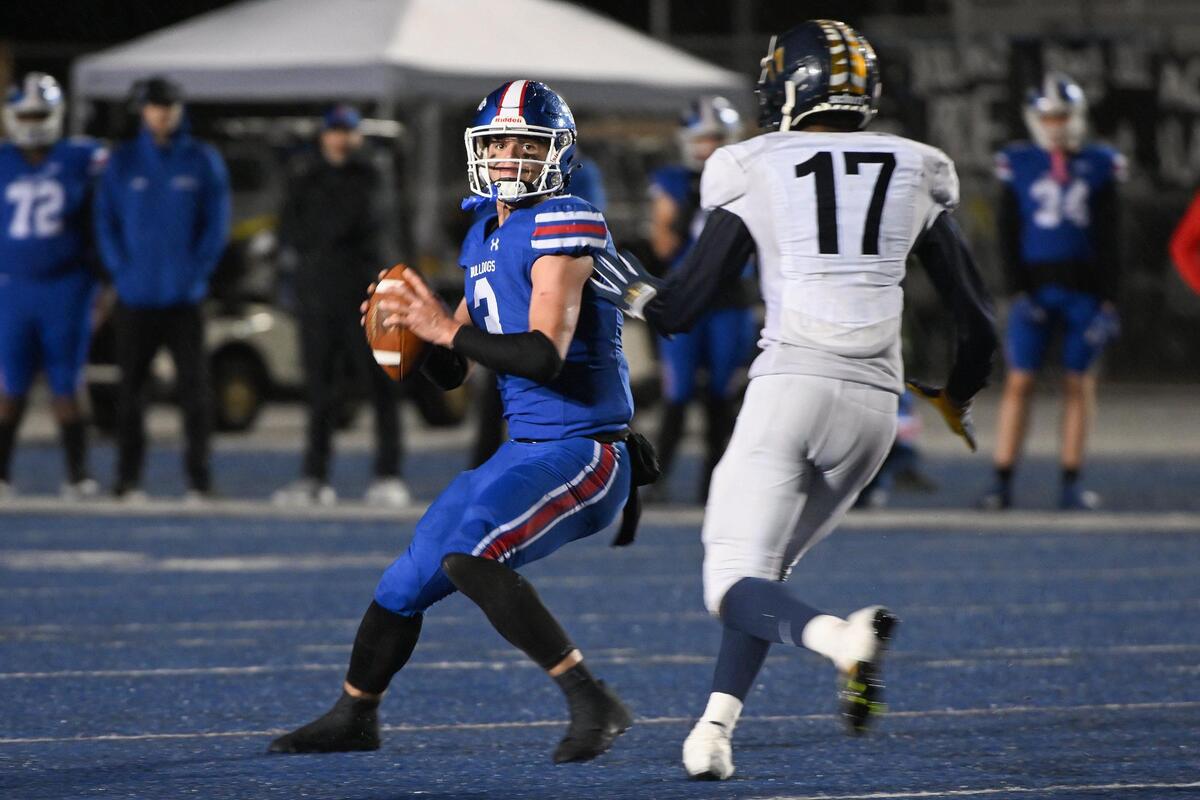 Inderkum Tigers defensive lineman Kamarrion Cook (17) puts pressure on Folsom quarterback Ryder Lyons (3) int the 2023 CIF Sac-Joaquin Division I section football semifinal.
