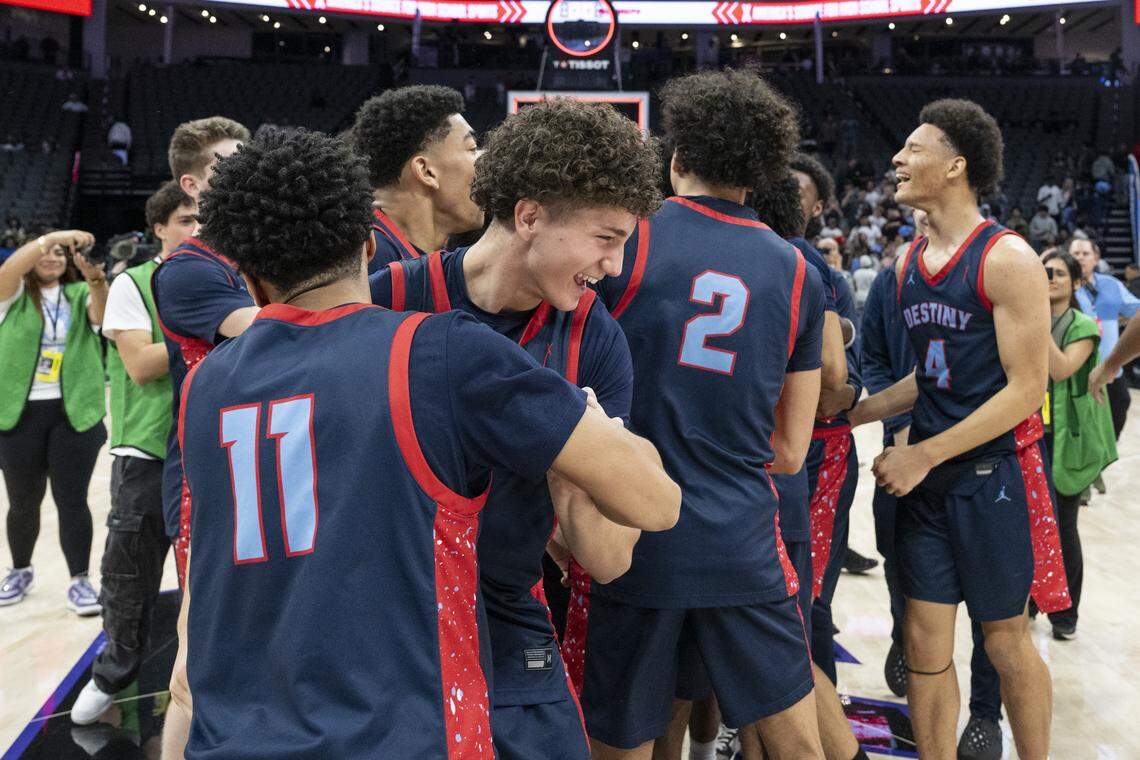 Destiny Christian Academy reacts after winning the CIF Sac-Joaquin Section Division II boys basketball championship at Golden 1 Center in Sacramento on Friday. 