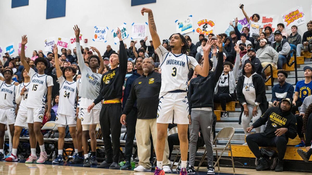 Inderkum Tiger guard Jermaine Haliburton (3) attempt a three point basket as teammates and fans cheer during the third quarter against Laguna Creek at the high school boys basketball CIF Sac-Joaquin Section playoff game Friday, Feb. 17, 2023, at Inderkum High School in Natomas. Inderkum won 69-55 to advance to the Division I section semifinals.