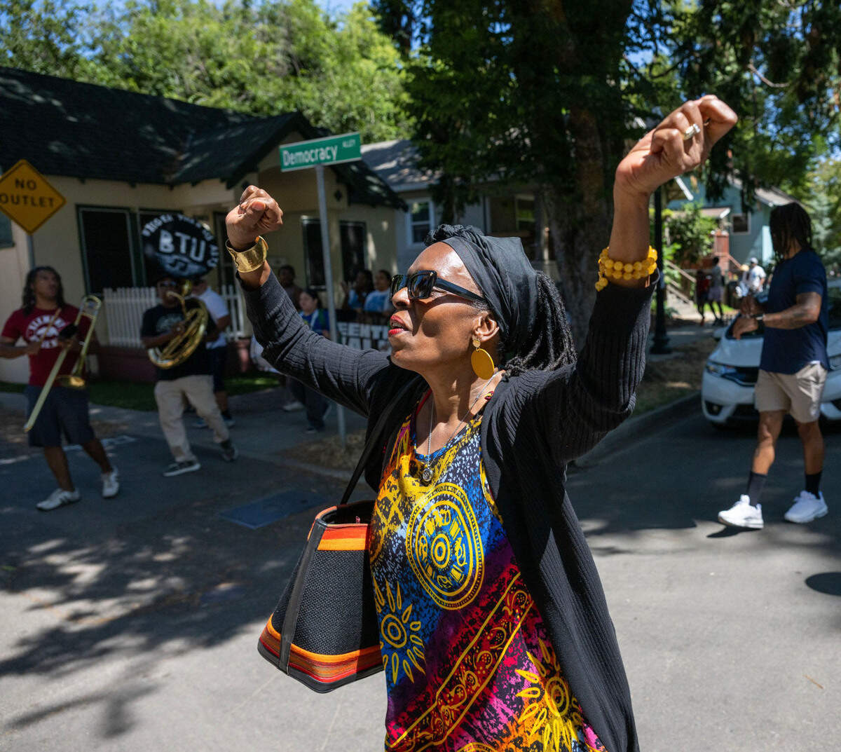 Anya Jaleane dances to the music of the New Orleans-style Element Brass Band as the group parades to the CapStage of the during the second annual Juneteenth Art Walk on Thursday, June 19, 2025, in Sacramento.