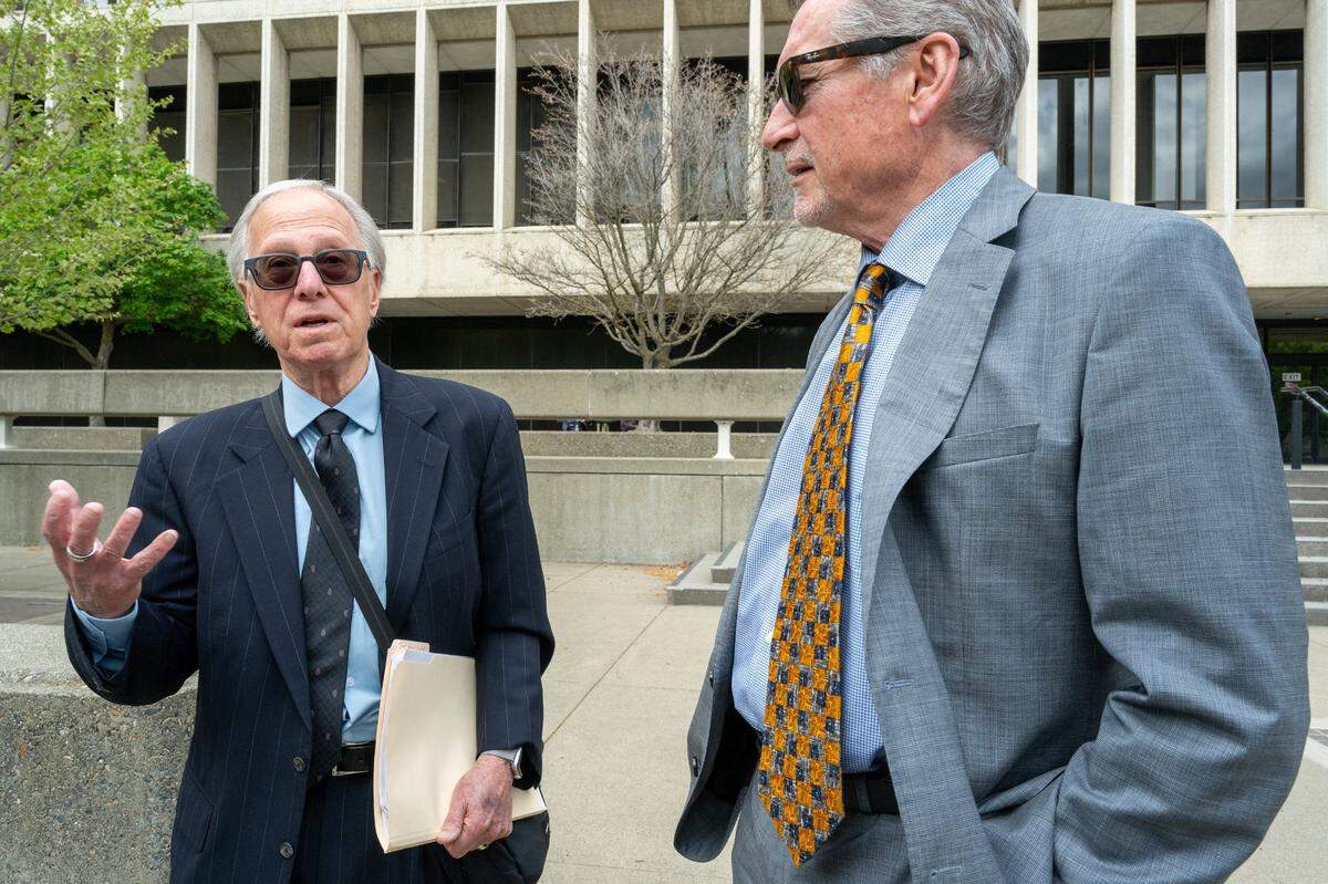 Defense attorneys Peter Kmeto, right, and Jan Karowsky, left, talk Thursday about the death penalty sentencing for their client Adel Ramos, who killed Sacramento Police Officer Tara O’Sullivan in June 2019.