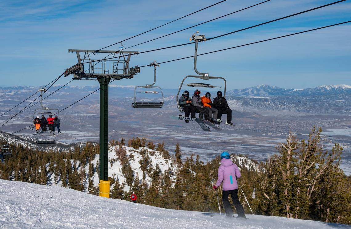 Snowboarders ride the Dipper Express lift at Heavenly Mountain Resortin South Lake Tahoe on Friday, Feb. 10, 2023.