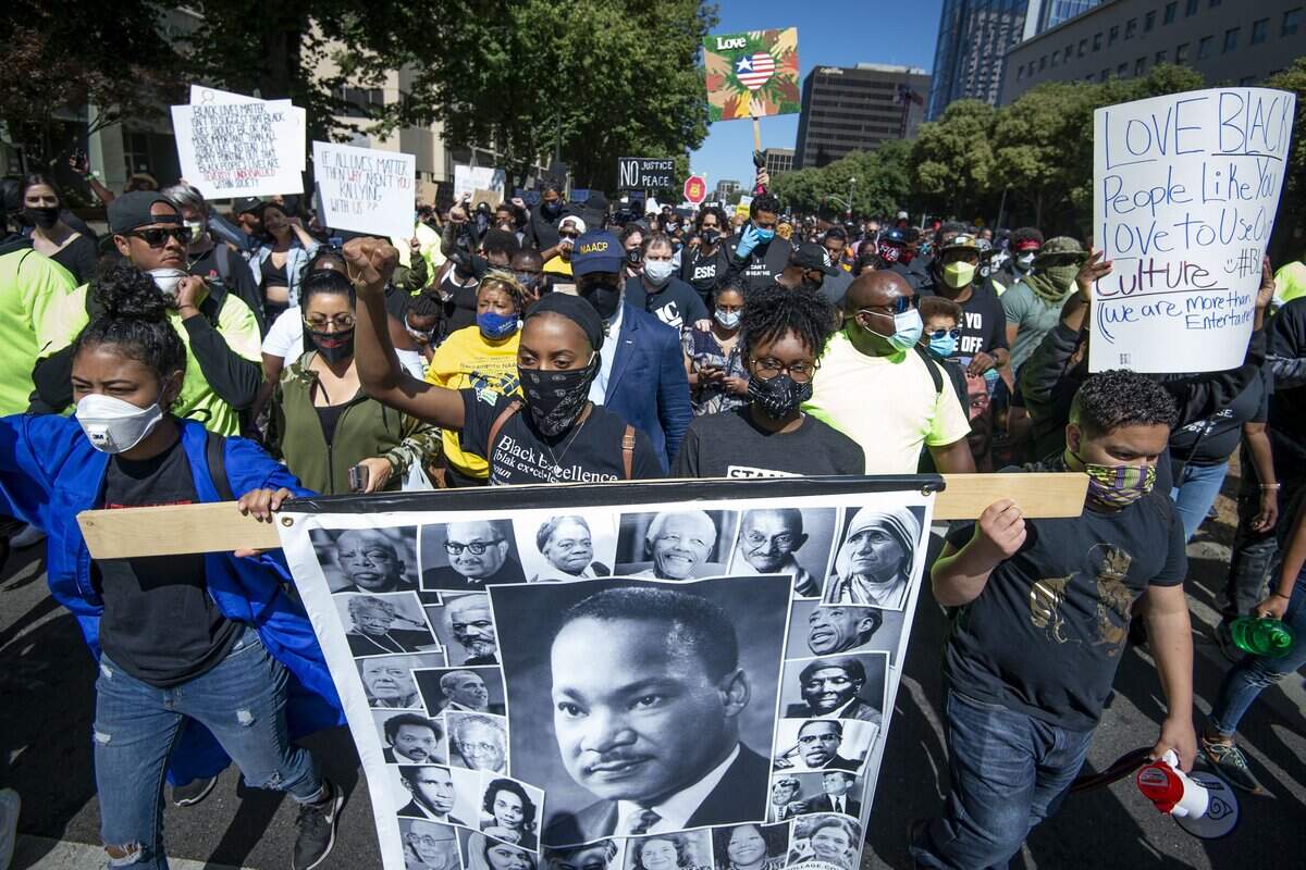 15. Thousands of protesters march down Capitol Mall in Sacramento on Saturday, June 6, 2020, from Golden 1 Center to protest the killing of George Floyd.
