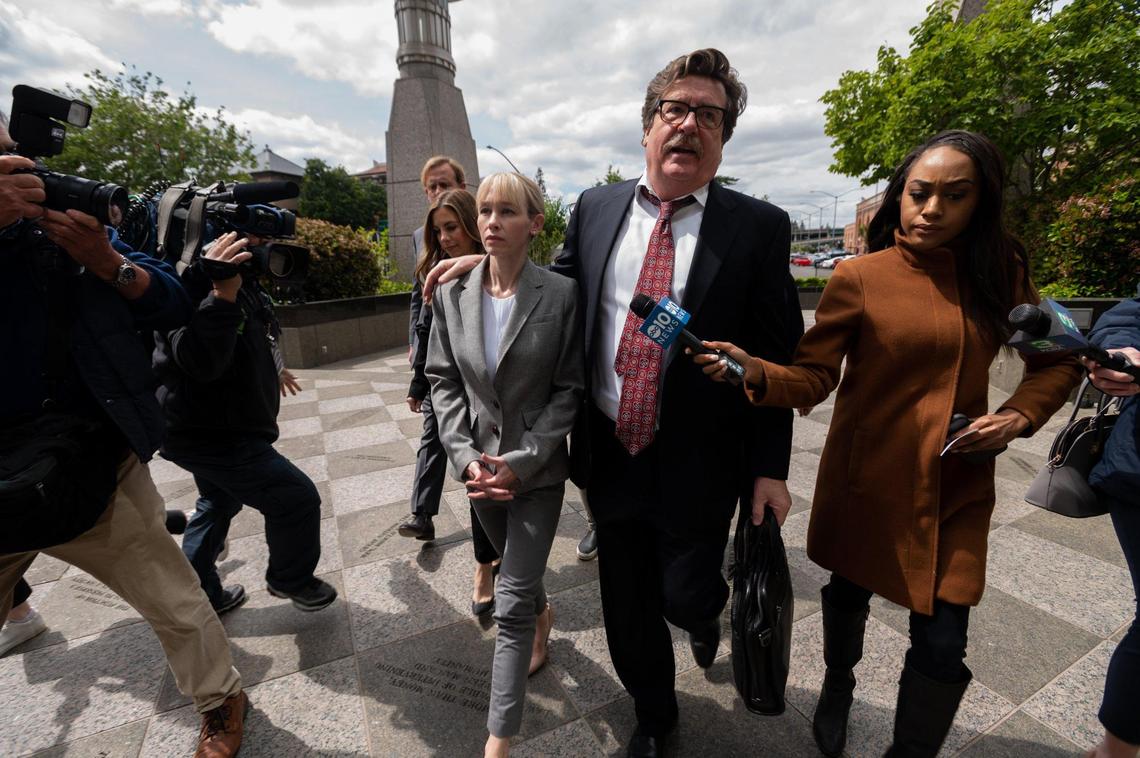 Sherri Papini arrives with her attorney, William Portanova, prior to her arraignment in federal court in Sacramento on April 13.