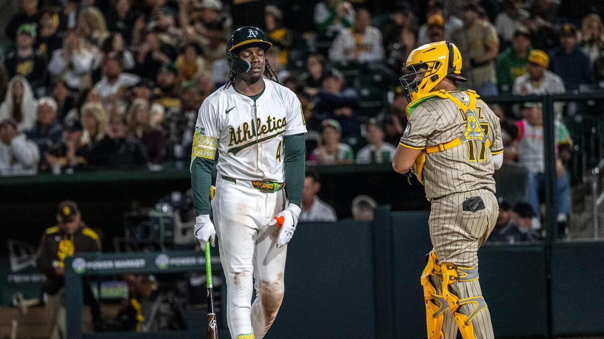 Athletics outfielder Lawrence Butler (4) walks off the home plate after striking out in the ninth inning of an MLB game against the San Diego Padres at Sutter Health Park on Monday. The A’s lost 5-4.