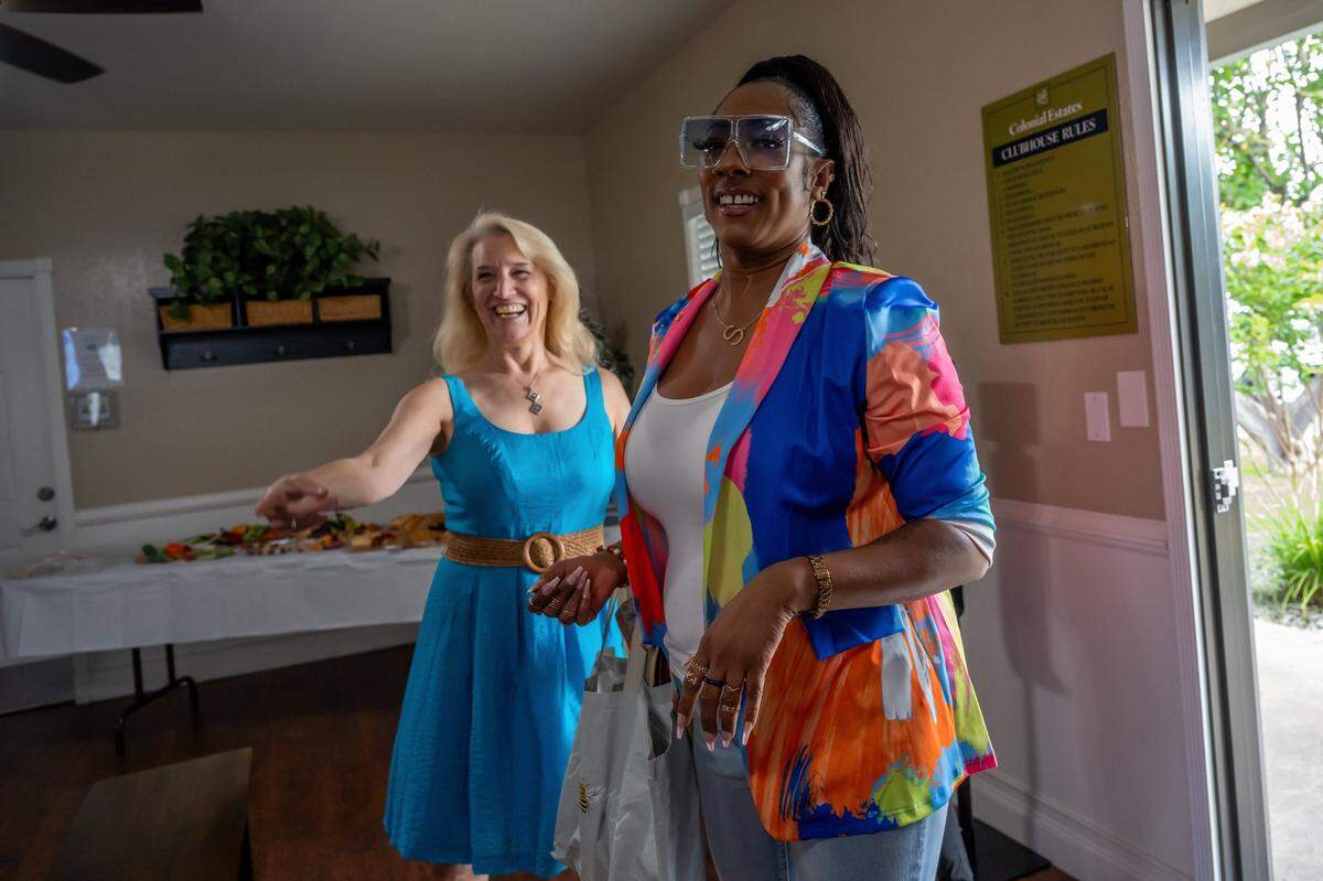 Lisa Culp, the leader of Women’s Empowerment, directs Shakela Ward, right, who formally was homeless, as she graduates from the RENEW program, a training program that could put her on the path to a career in property management on Friday, Aug. 31, 2024. “I feel like Women’s Empowerment was the catalyst into RENEW,” said Ward who earlier graduated from Women’s Empowerment.