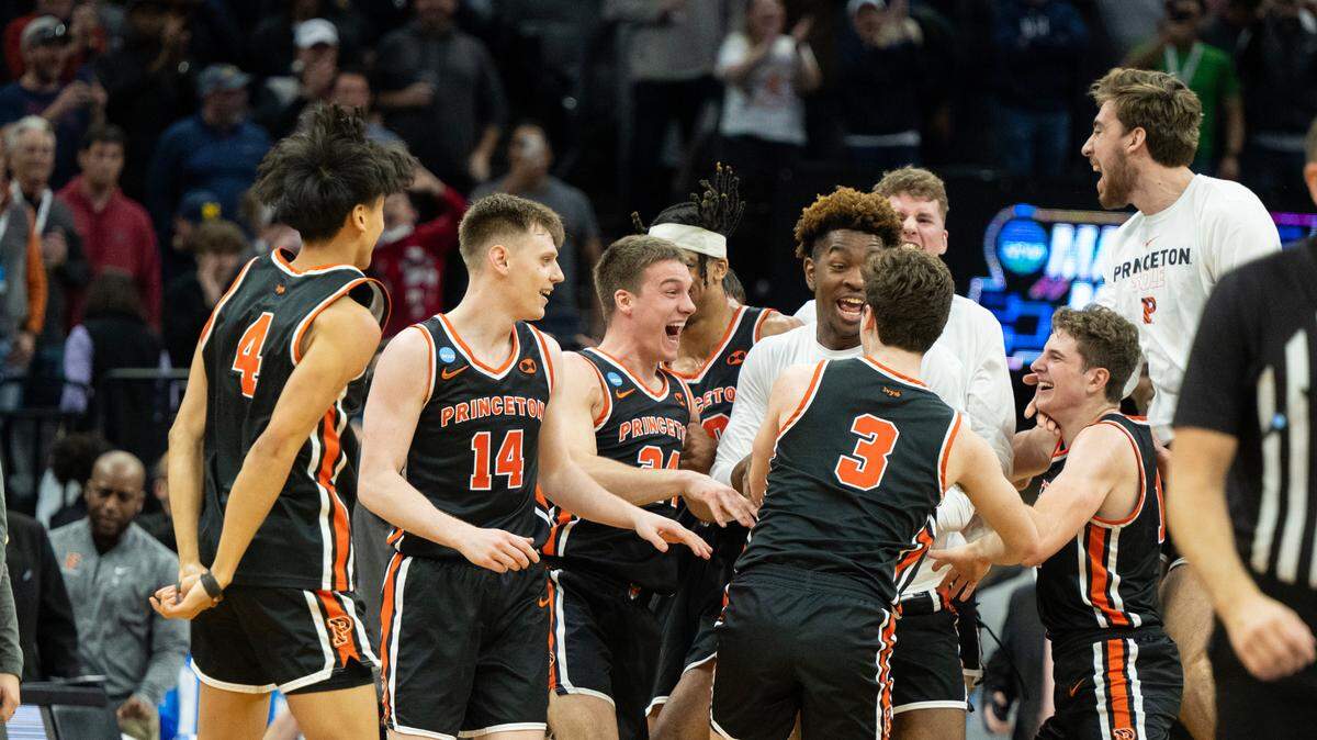 Princeton Tigers celebrates after beating Arizona Wildcats 59-55 during a game in the NCAA Tournament at Golden 1 Center in Sacramento, Thursday, March 16, 2023.