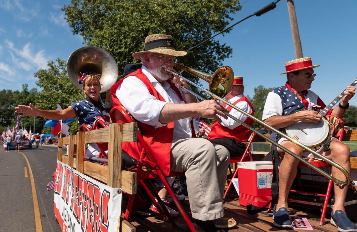 Performers with the Red Hot Peppers Jazz Band make their way down Coloma Road during the Rancho Cordova Fourth of July Celebration parade on Saturday, July 3, 2021, in Rancho Cordova.