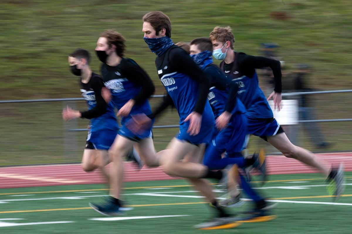El Dorado High School junior varsity runners warm up at a cross country meet at Union Mine High School on Monday, Jan. 25, 2021 in El Dorado. It was the first high school sporting event in the Sacramento region since March 2020, when the coronavirus pandemic stopped high school sports competitions.