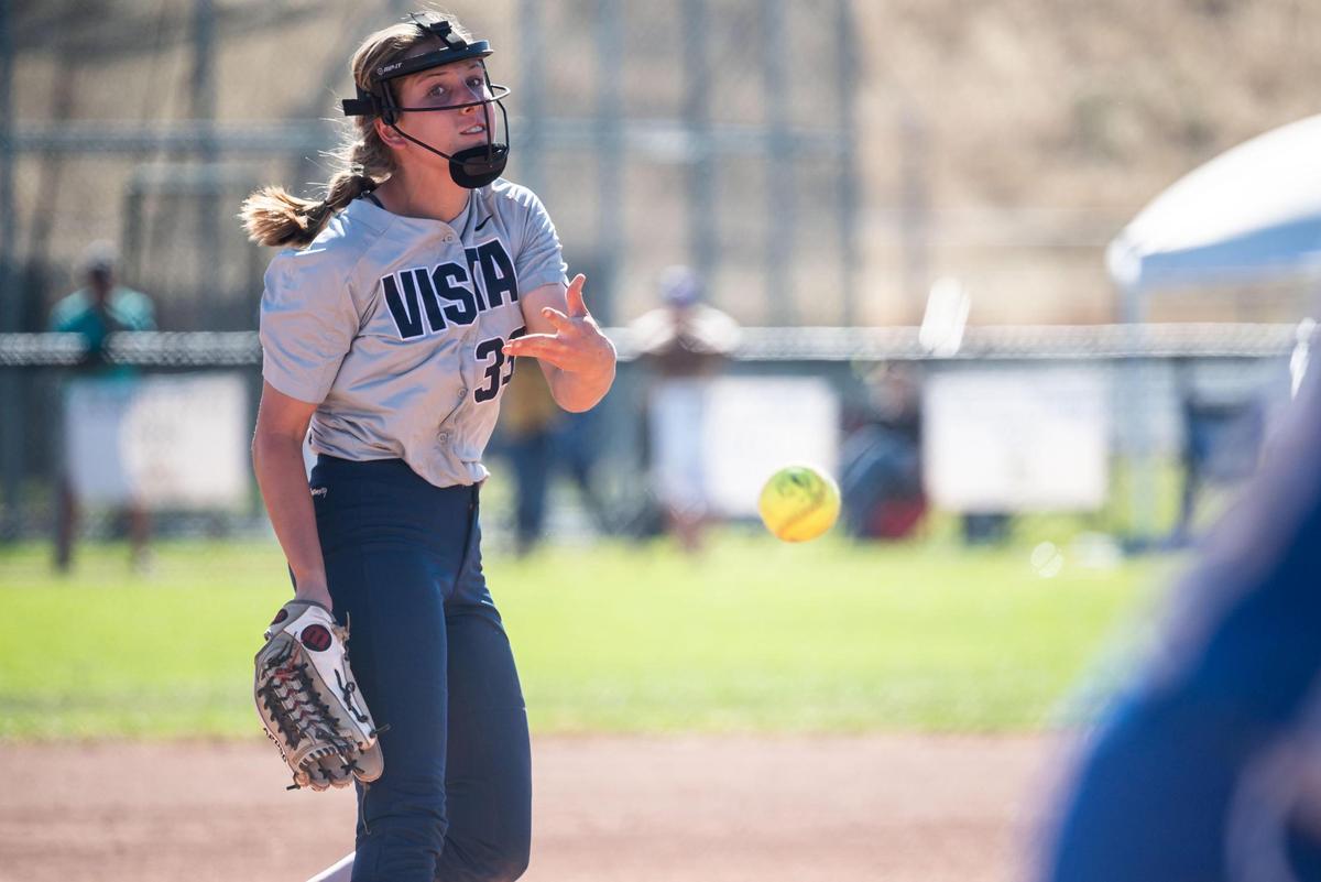 Vista Del Lago’s Olivia Manchester throws to Benicia’s Denise Pauletich in the third inning Tuesday, May 31, 2022, at Vista Del Lago High School in Folsom during the first round of the high school softball Division II CIF NorCal Softball Championships.