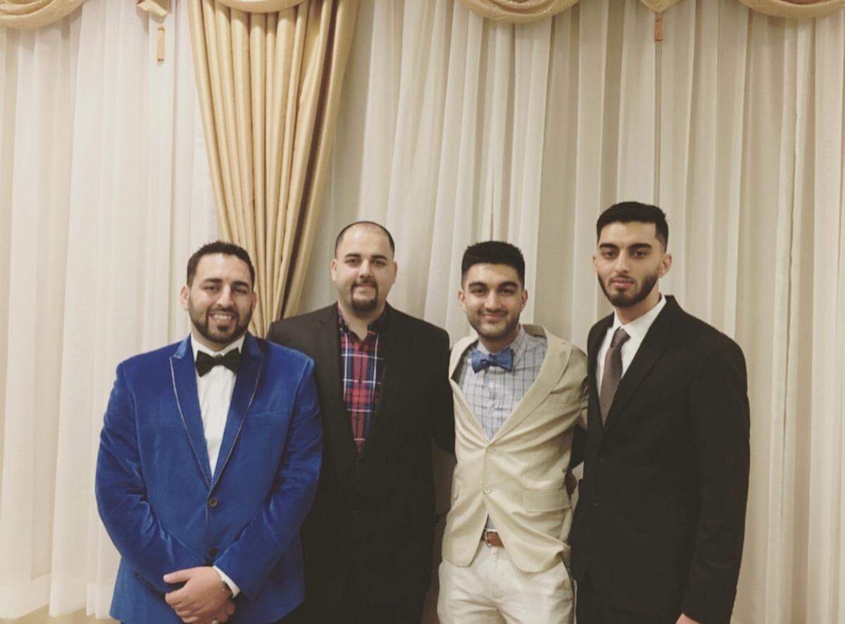 Zadir Omaid (right), the man hit by a train in Consumnes River Preserve on June 16, with his three brothers, Basir (left), Nazir and Qadir.