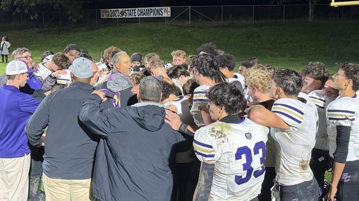 Bradshaw Christian coach Drew Rickert congratulates the Pride after their 36-30 victory over Woodland Christian on Friday in Woodland. Bradshaw Christian plays at 11-0 Sonora next. 