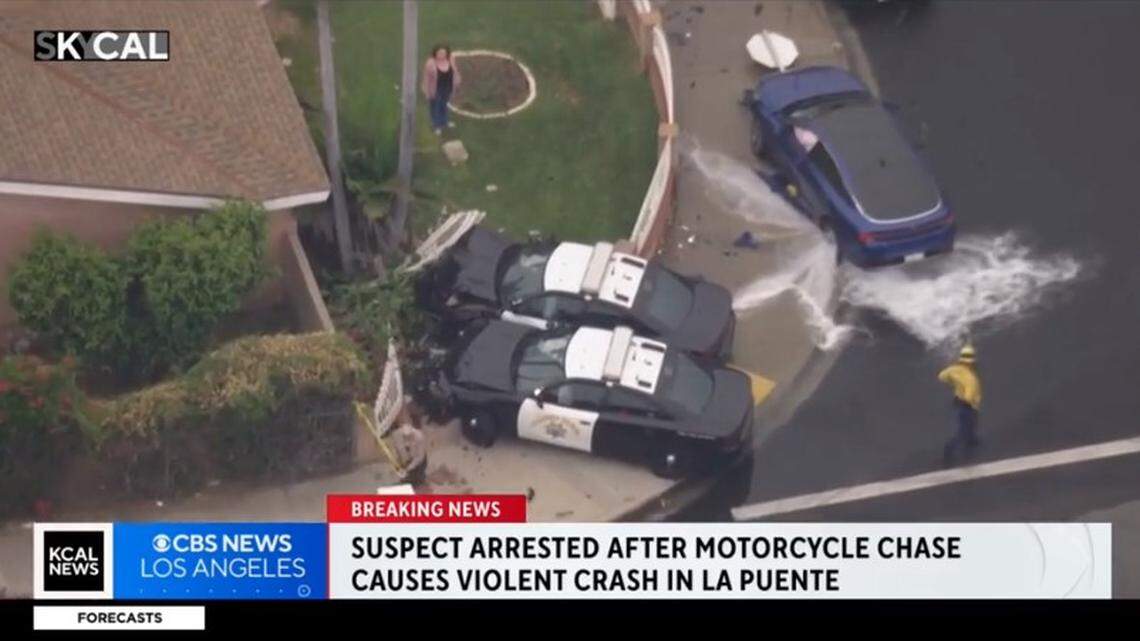 Two California Highway Patrol cars slammed into the same La Puente home while chasing a motorcyclist, authorities say.