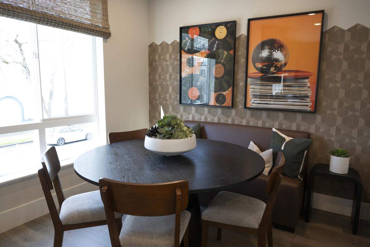 A dining nook inside one of the display units at the R21 housing development in Sacramento on Thursday. The unit used hexagonal tiles as a part of drawing inspiration from The Sacramento Bee, the parking lot of which the housing development is built on.
