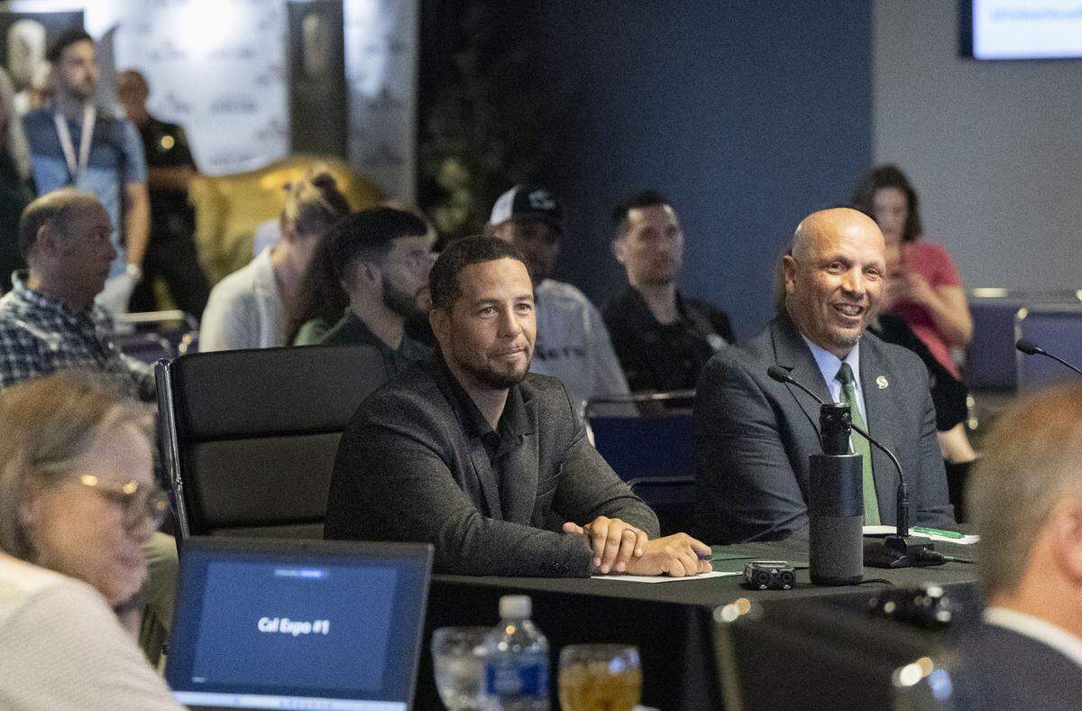 Sacramento State President Luke Wood and Athletic Director Mark Orr listen to board members of the California Exposition & State Fair on Thursday as they discuss an exploratory agreement related to a potential Sacramento State football stadium on their site.