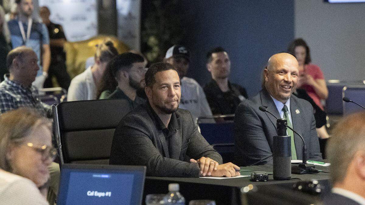 Sacramento State President Luke Wood and Athletic Director Mark Orr listen to board members of the California Exposition & State Fair on Thursday, Aug. 28, 2025, as they discuss an exploratory agreement related to a potential Sacramento State football stadium on their site.