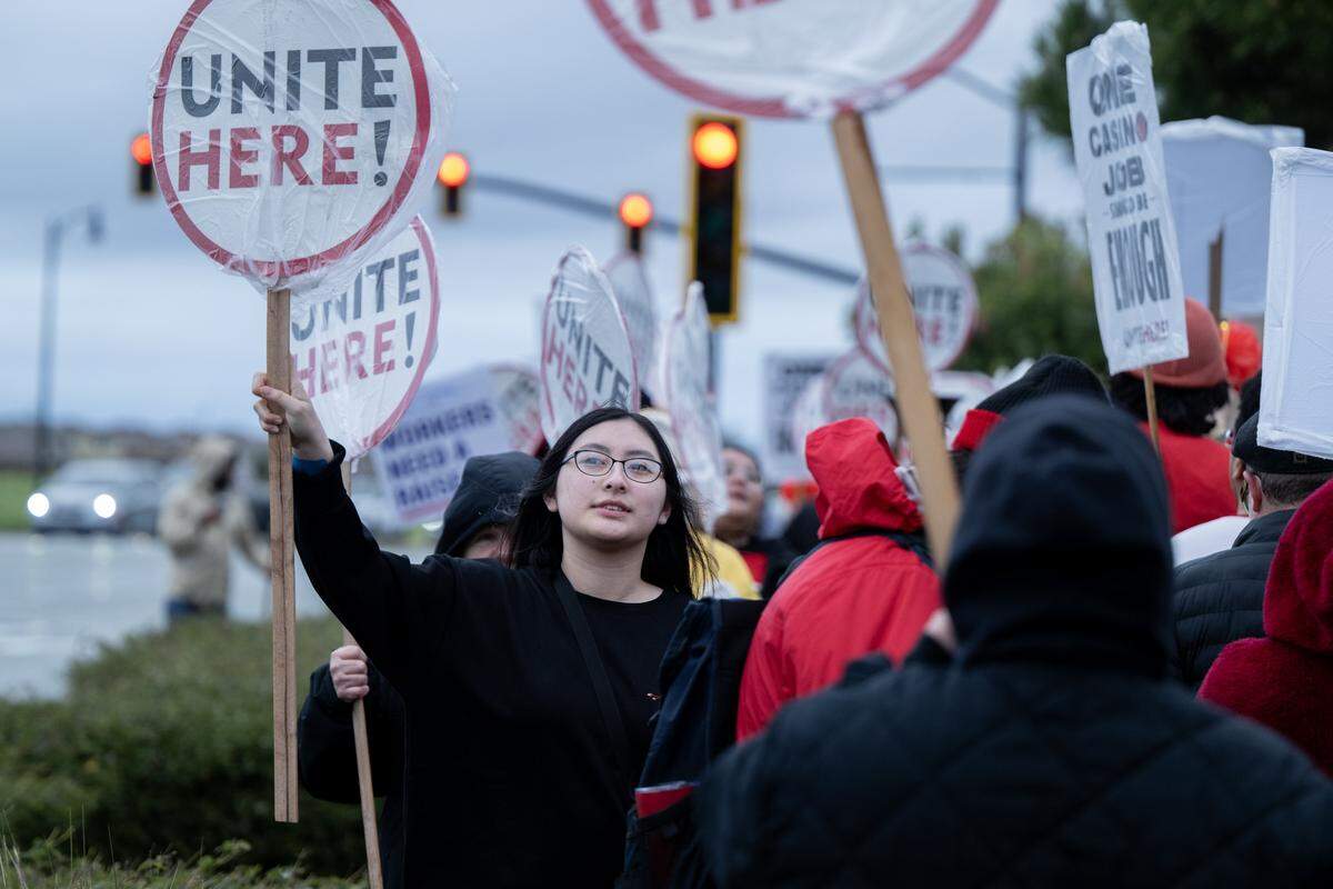 Sky River employees and supporters picket outside the casino for better wages and benefits on Tuesday in Elk Grove.