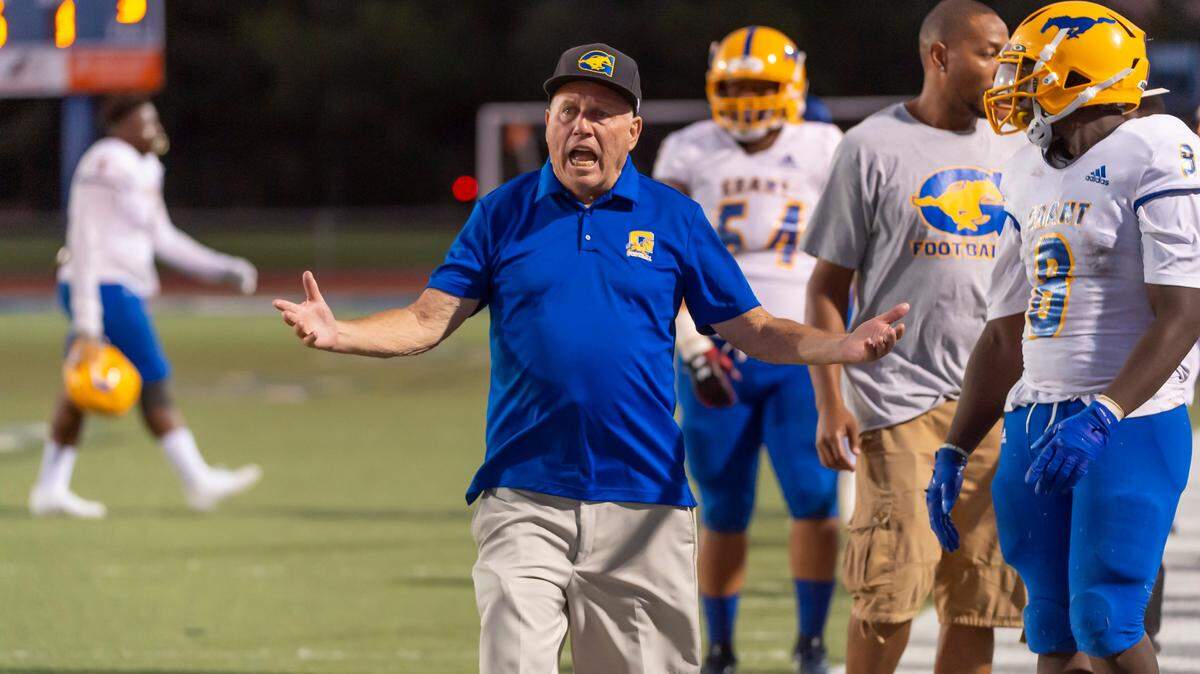Grant High School Pacers head coach Mike Alberghini, yells during the first half as the Davis High School Blue Devils host the Grant High School Pacers, Friday Aug 23, 2019.