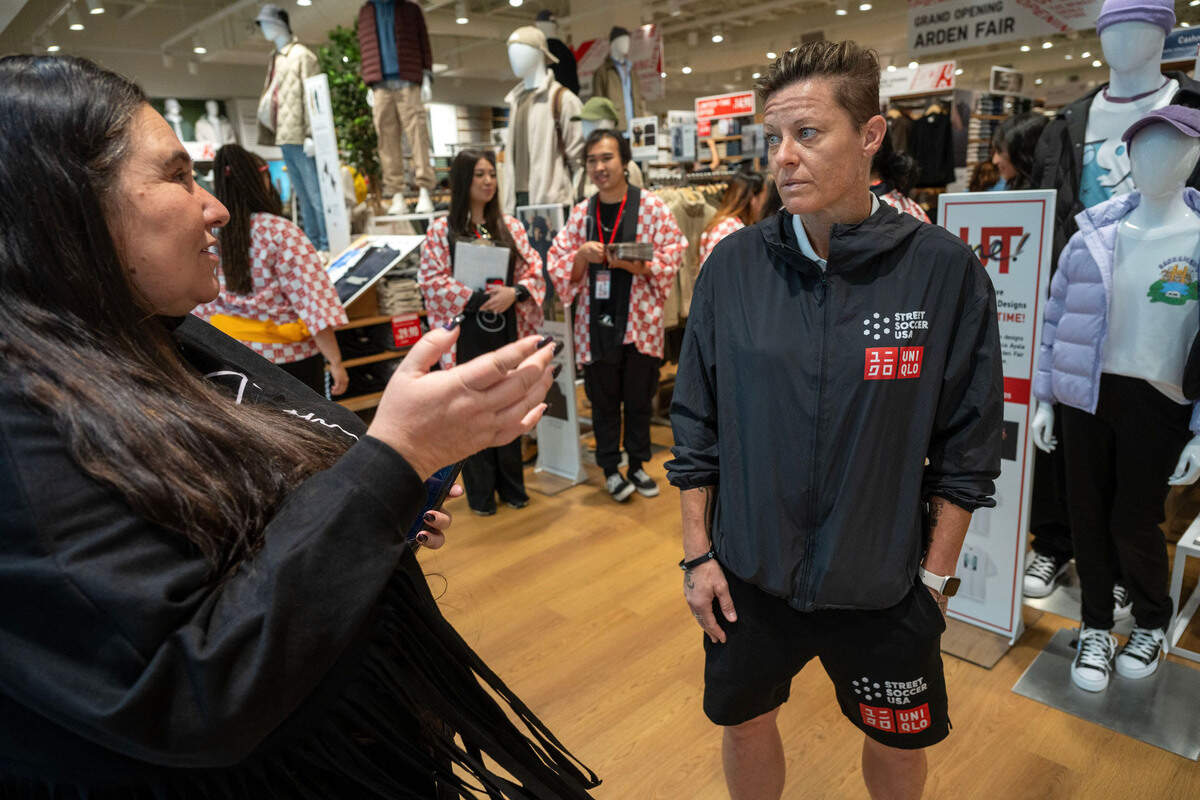 Crystal Sanchez, president of the Sacramento Homeless Union, and Lisa Wrightsman, managing director of Street Soccer USA, speak during the grand opening of Uniqlo at Arden Fair mall in Sacramento on Friday, Sept. 13, 2024. Both nonprofits will receive support from the retailer.
