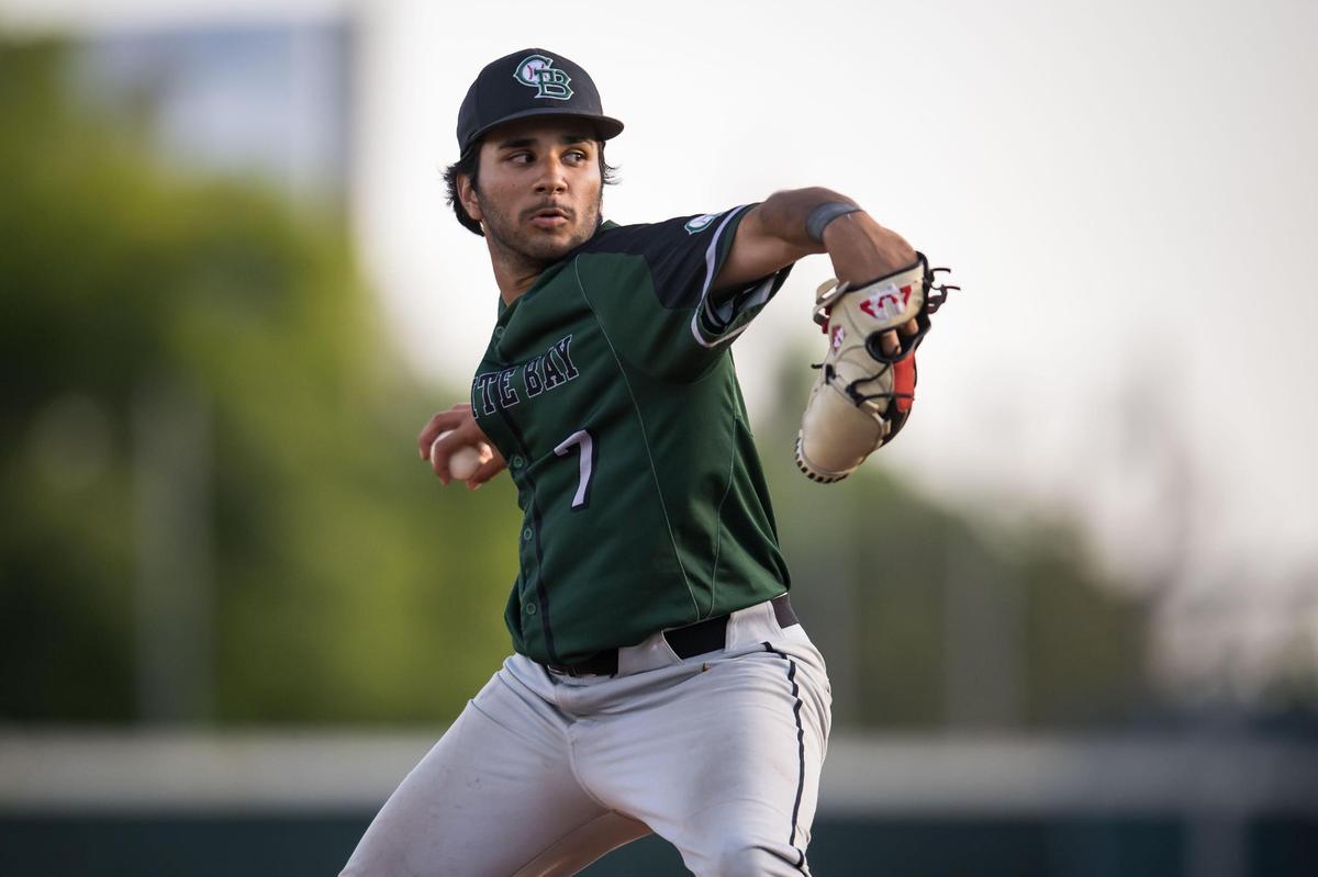 Granite Bay Grizzlies pitcher Jack Ghufran (7) throws against Rio Americano Raiders batter Brady Wilson (20) during the fourth inning at the CIF Sac-Joaquin Section Division II high school baseball championship game Thursday, May 25, 2023, at Sacramento City College. The Grizzlies beat the Raiders for the title for the second year in a row.