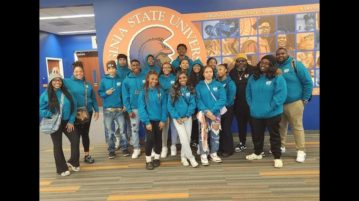 Sacramento-area high school students pose for a photo at Virginia State University, a historically Black university, during a recent tour with Voice of the Youth along with the nonprofit’s founder, Berry Accius.