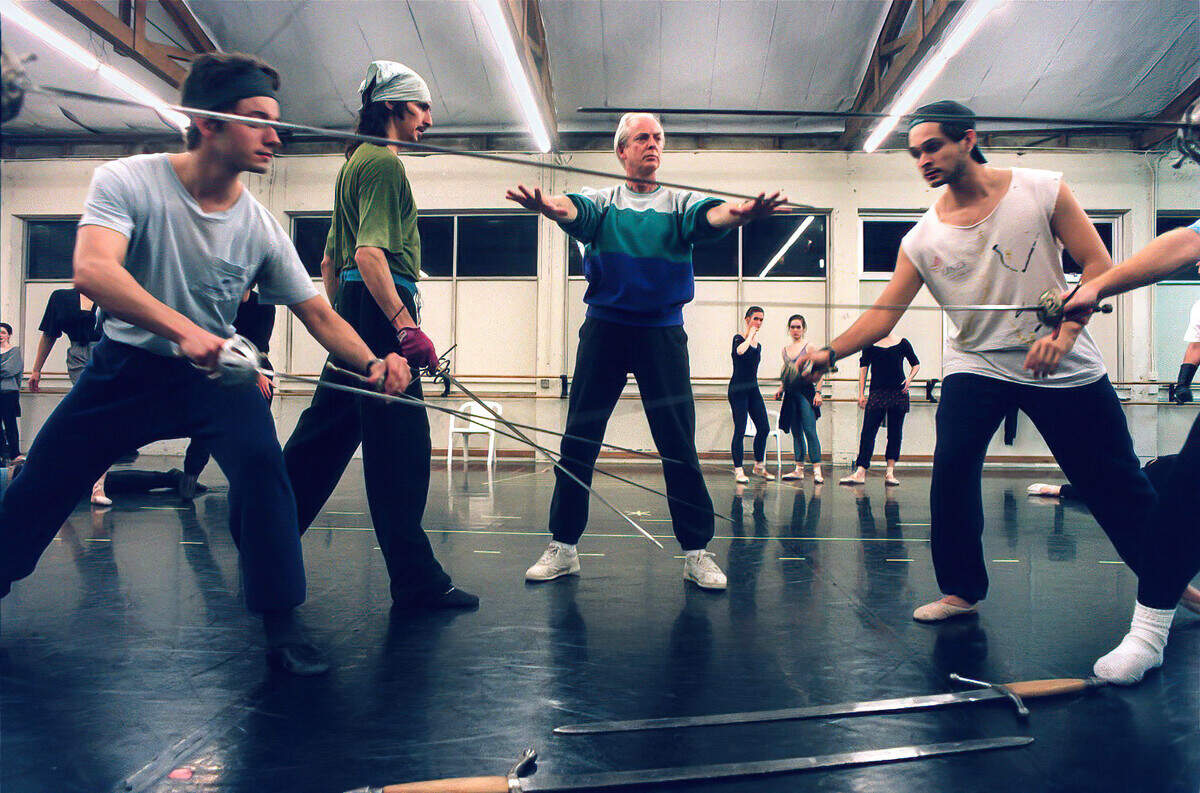 Sacramento Ballet Artistic Director Ron Cunningham directs fencing practice for a production of “Romeo and Juliet” with his dancers in 1995.