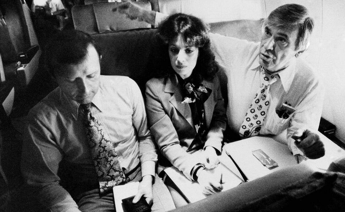 A Nov. 1978 file photo shows Congressman Leo J. Ryan, right, with congressional staff member James Schollaert, left and Ryan aide Jackie Speier, center, aboard the aircraft carrying them to Guyana. Ryan was killed and Speier was injured in the Nov. 18, 1978 tragedy. Schollaert remained in Georgetown and was not injured.