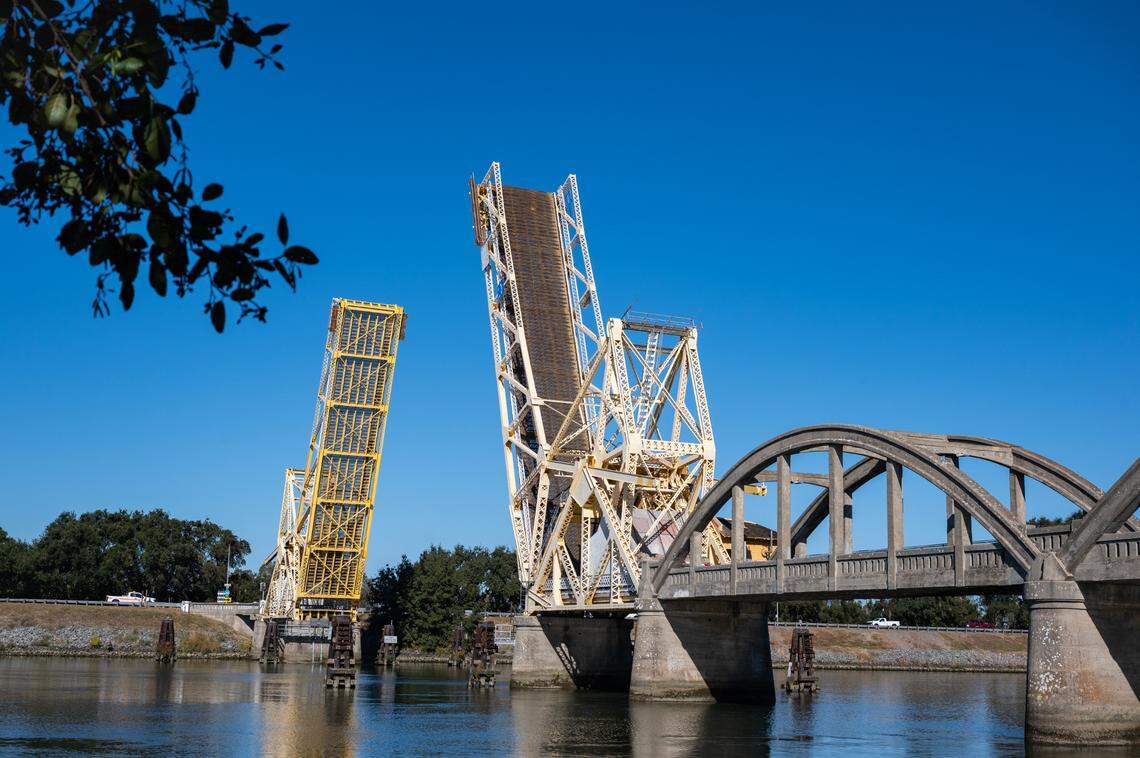 The Isleton Bridge, a historic bascule drawbridge over the Sacramento River just outside Isleton city limits, is ceremonially opened on Friday, Oct. 27, 2023, the 100th anniversary of its first day of operation.