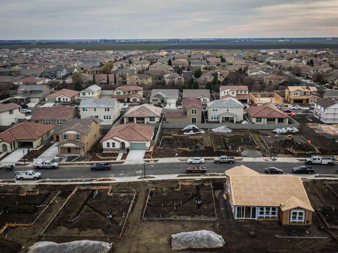 Construction of homes continues in the Spring Lake housing development in Woodland as captured in this drone image on Tuesday, Dec. 17, 2019.